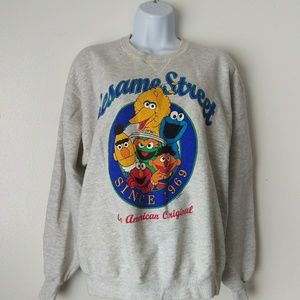 Sesami Street sweater size L.